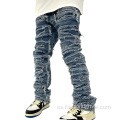 Pantalones de jeans lavados desgastados con rasgadura personalizada